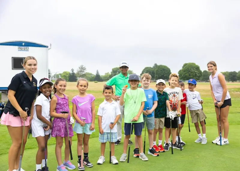 Junior campers lined up with their coaches