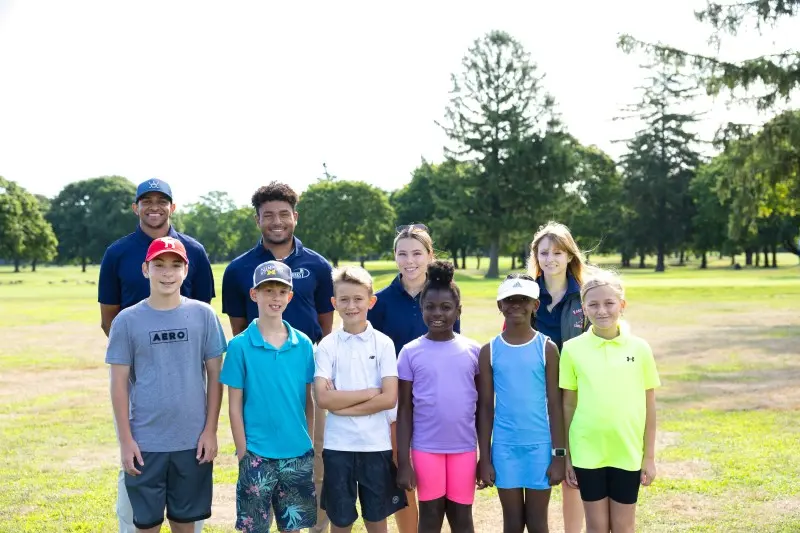 Juniors and coaches on the range